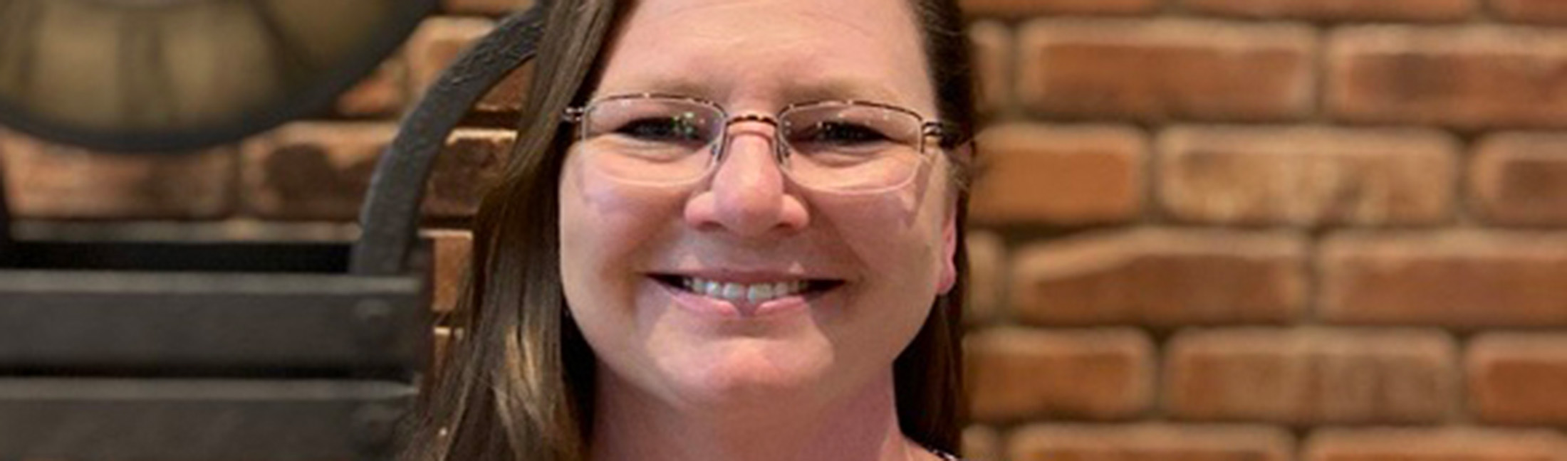 Chris Ryan was recognized in the fourth quarter employee spotlight for her support of Commerce’s Wood Products Revolving Loan Fund and Native American Collateral Support Program. Photo credit: Commerce.
